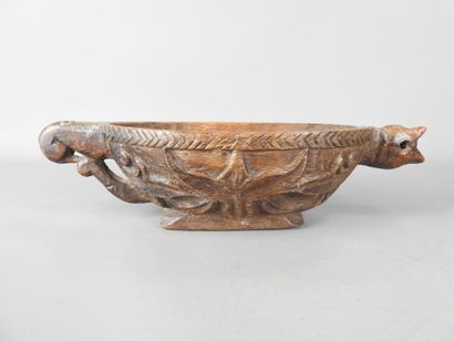 Carved wood NAVETTE with zoomorphic and floral...