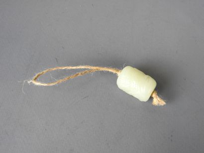 Jade pendant carved with a dragon. Height:...