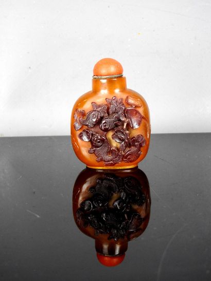 CHINA - 20th century
Orange glass snuff bottle...