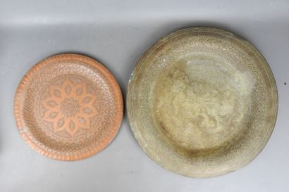 NORTH AFRICA: Two red and yellow copper dishes...