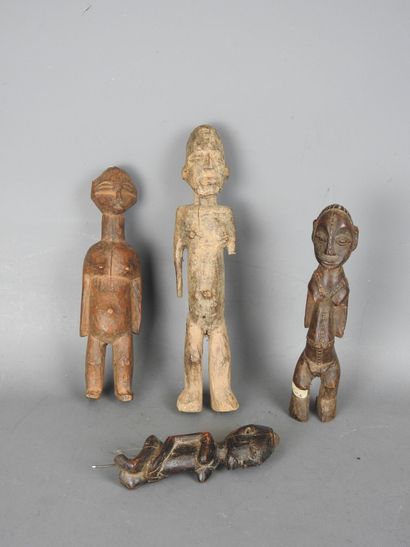 LOBI, Burkina Faso: Four protection statuettes...