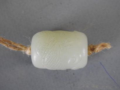 Jade pendant carved with a dragon. Height:...