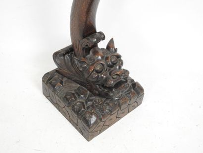 CHINA: Carved wood saddle, the zoomorphic...