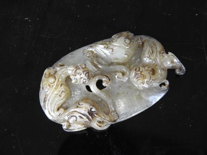 CHINA: Carved jade plate decorated with Fô...