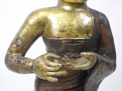 DISCIPLE de BOUDDHA en cuivre repoussé doré,...