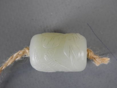 Jade pendant carved with a dragon. Height:...