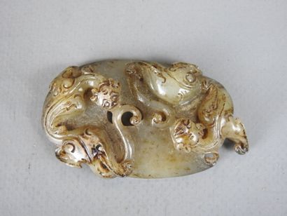 CHINA: Carved jade plate decorated with Fô...