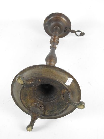 OTTOMAN CANDLESTICK in patinated bronze with...