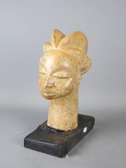 GABON: Female head with prognathic face in...