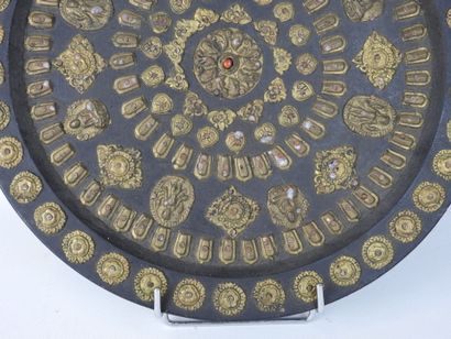 TIBET: Circular panel decorated with copper-alloy...