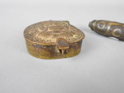 TIBET: DZI resin amulet. L: 7 cm. 
A small...