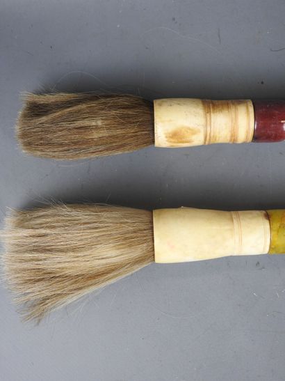 JAPAN: Two calligraphy brushes with hard...