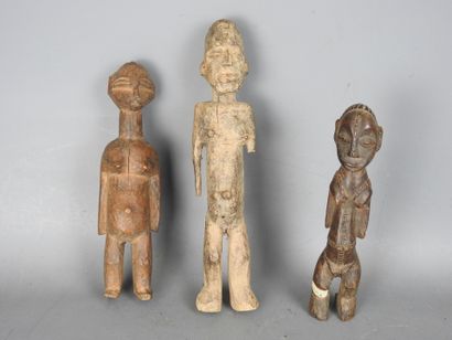 LOBI, Burkina Faso: Four protection statuettes...