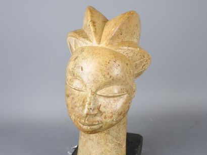 GABON: Female head with prognathic face in...