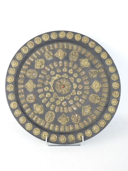 TIBET: Circular panel decorated with copper-alloy...
