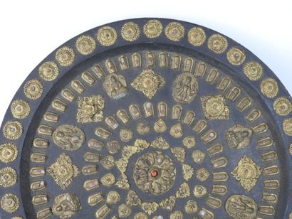 TIBET: Circular panel decorated with copper-alloy...