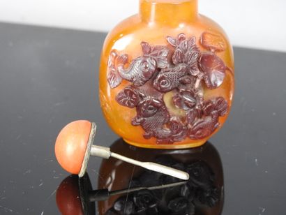 CHINA - 20th century
Orange glass snuff bottle...