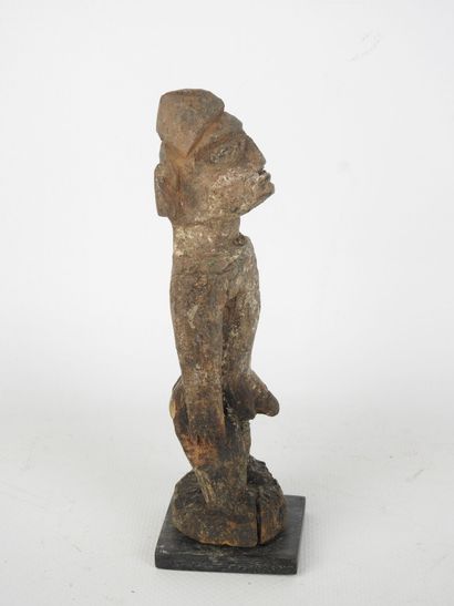 NIGERIA: Yoruba male statuette in carved...