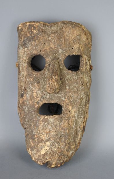 NEPAL: Large mask carved with a human face,...