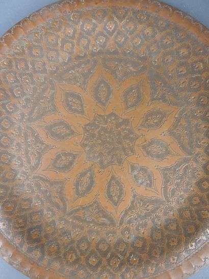 NORTH AFRICA: Two red and yellow copper dishes...
