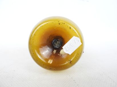 BALSAMAIRE in amber glass. H. 12 cm . Firing...