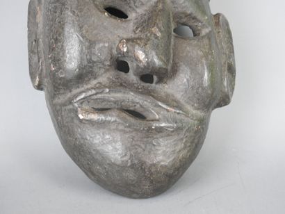 NEPAL: Carved wood mask of facial aphasia....
