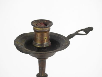 OTTOMAN CANDLESTICK in patinated bronze with...