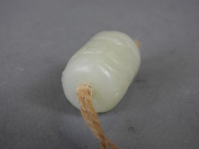 Jade pendant carved with a dragon. Height:...