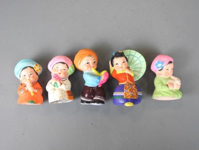 CHINE - Wuxi : 4 petits masques en argile...