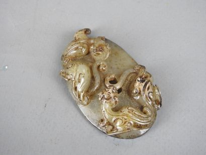 CHINA: Carved jade plate decorated with Fô...