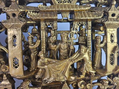 CHINE, XXe.
Panneau en bois richement sculpté...