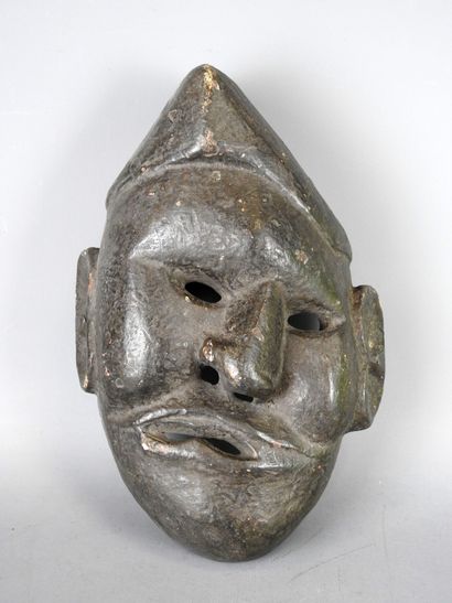 NEPAL: Carved wood mask of facial aphasia....