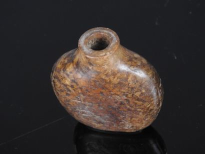 CHINA - 19th century
Flat-shaped brown jade...