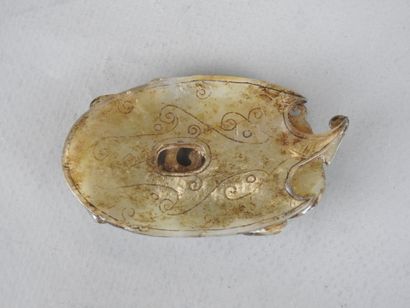 CHINA: Carved jade plate decorated with Fô...