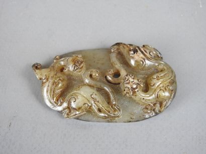 CHINA: Carved jade plate decorated with Fô...