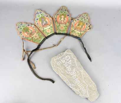 Stone amulet with carved inscription decoration....