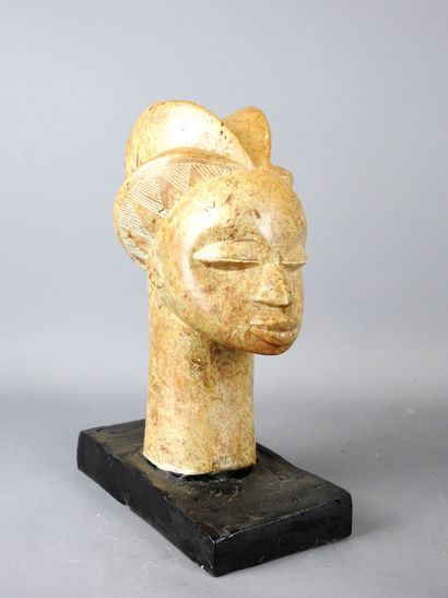 GABON: Female head with prognathic face in...