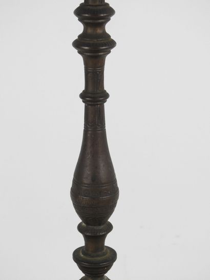 OTTOMAN CANDLESTICK in patinated bronze with...