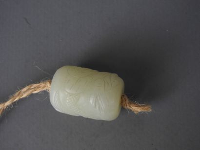 Jade pendant carved with a dragon. Height:...