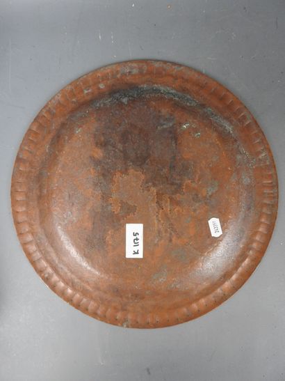 NORTH AFRICA: Two red and yellow copper dishes...