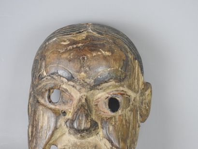 TERAIL, Nepal : Carved wooden dance mask....