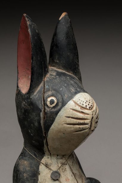THAILAND.
Wooden votive statue carved with...