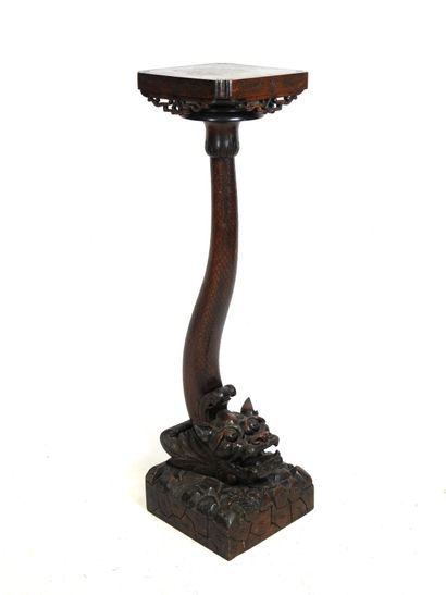 CHINA: Carved wood saddle, the zoomorphic...