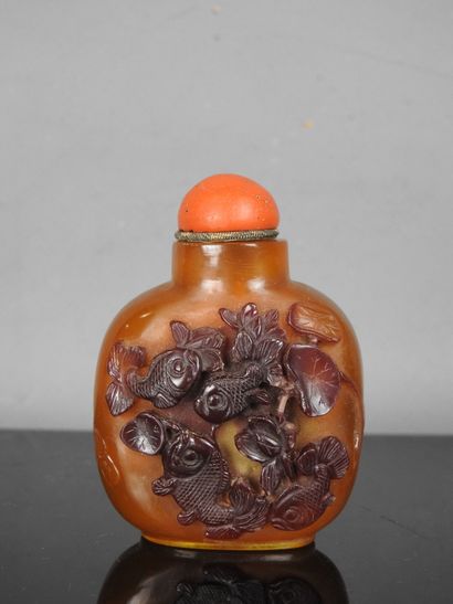 CHINA - 20th century
Orange glass snuff bottle...