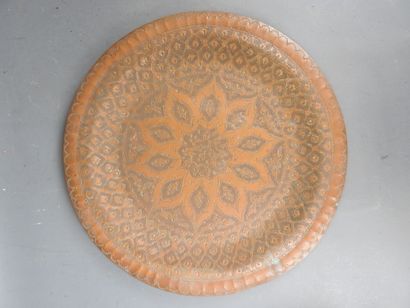 NORTH AFRICA: Two red and yellow copper dishes...