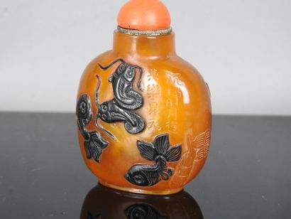 CHINA - 20th century
Orange glass snuff bottle...
