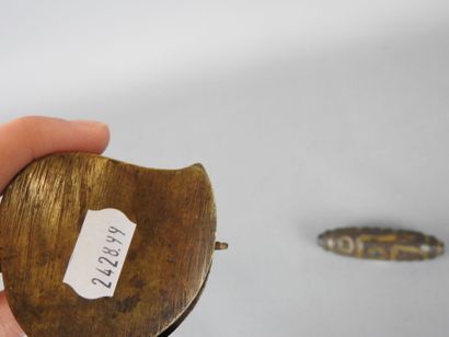 TIBET: DZI resin amulet. L: 7 cm. 
A small...