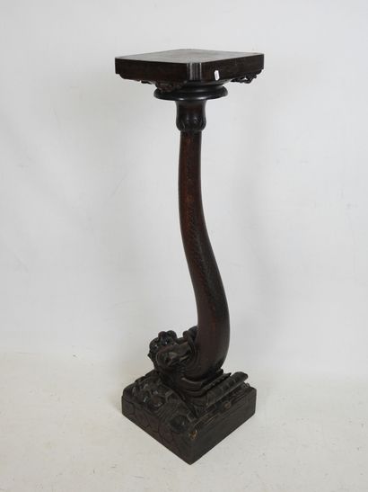 CHINA: Carved wood saddle, the zoomorphic...