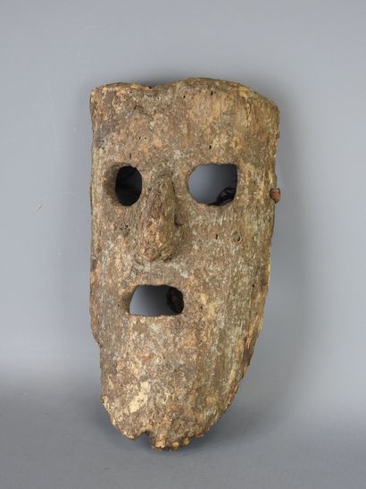 NEPAL: Large mask carved with a human face,...