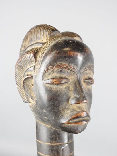 Ivory Coast. Hard wood with black-brown patina....